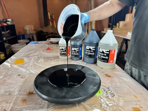 pouring black epoxy