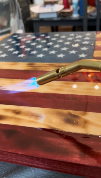 torch wooden flag